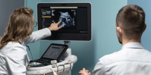 gynecologist-performing-ultrasound-consultation (1)